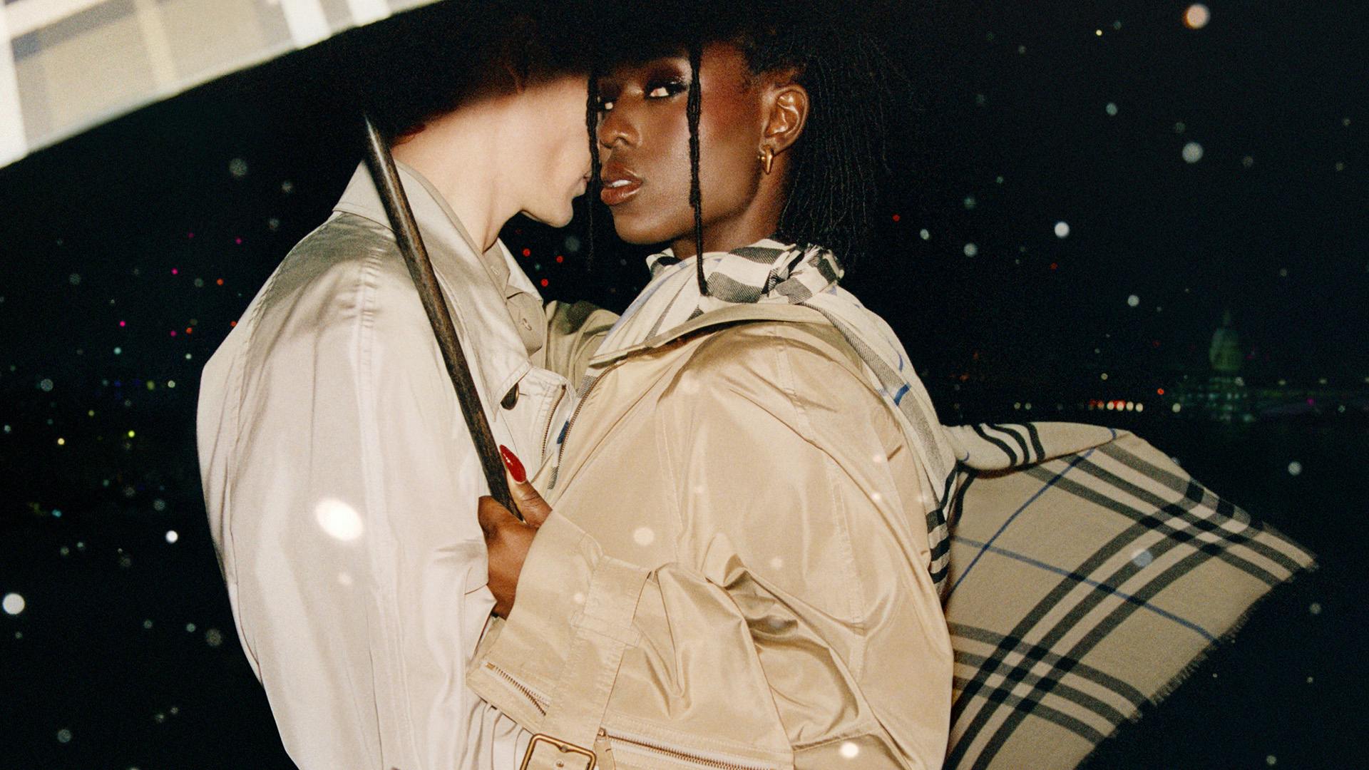 Still from Burberry's London in Love campaign showing actor Jodie Turner Smith holding an umbrella and wearing a trench coat