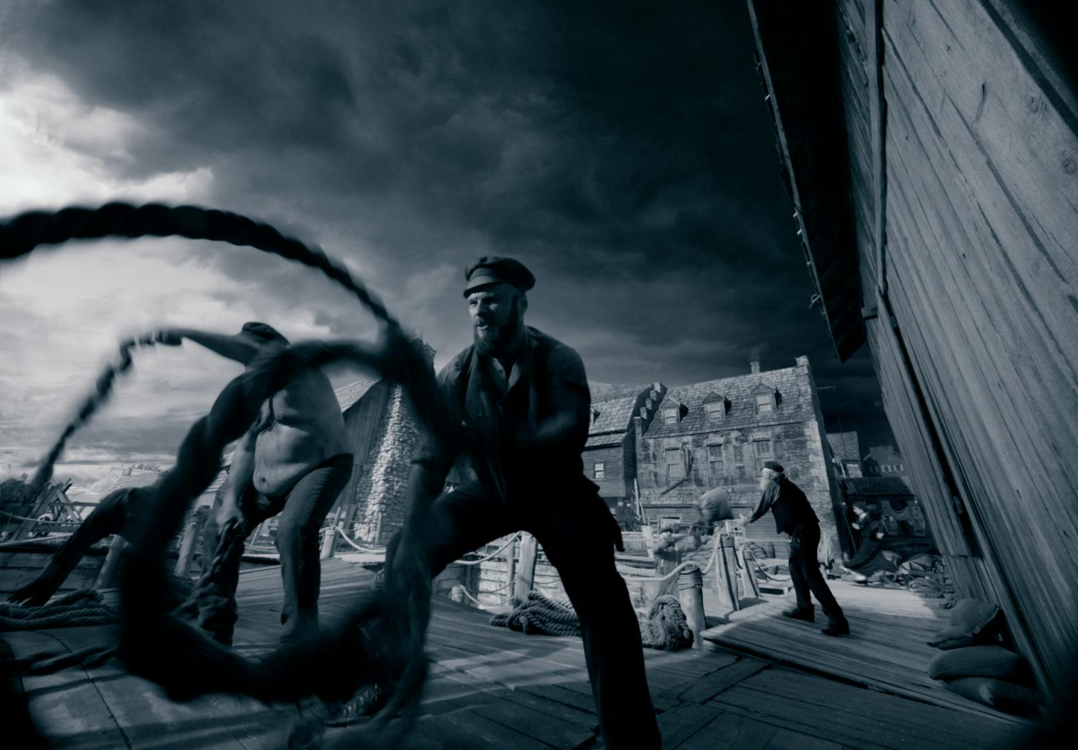 A man works out with ropes