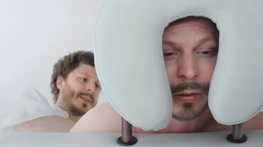 Michael Cera gives himself a massage
