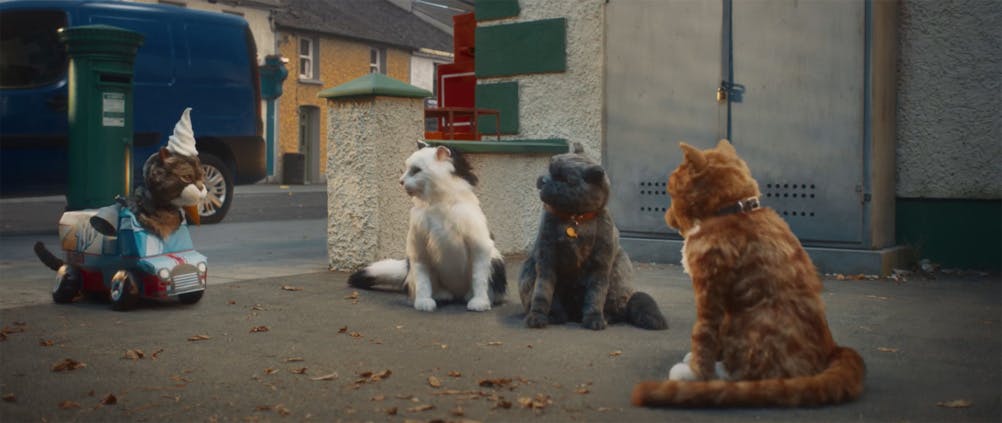 Still from Tesco Mobile Ireland advert showing a group of puppet cats in a street